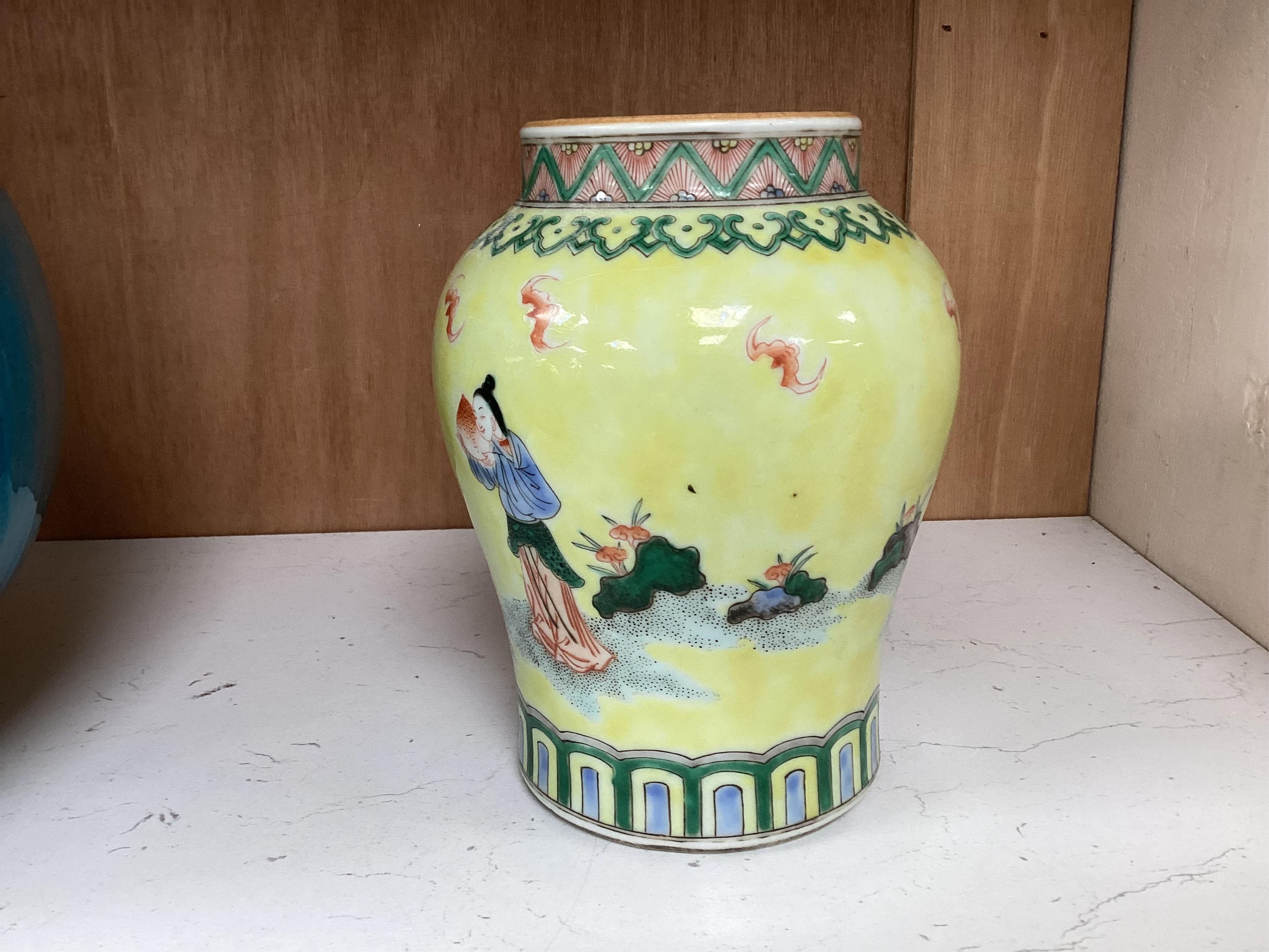 A Chinese yellow ground figurative vase, 15.5cm high. Condition - good